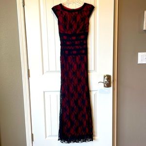 Very cute long sheer black with red underneath size medium